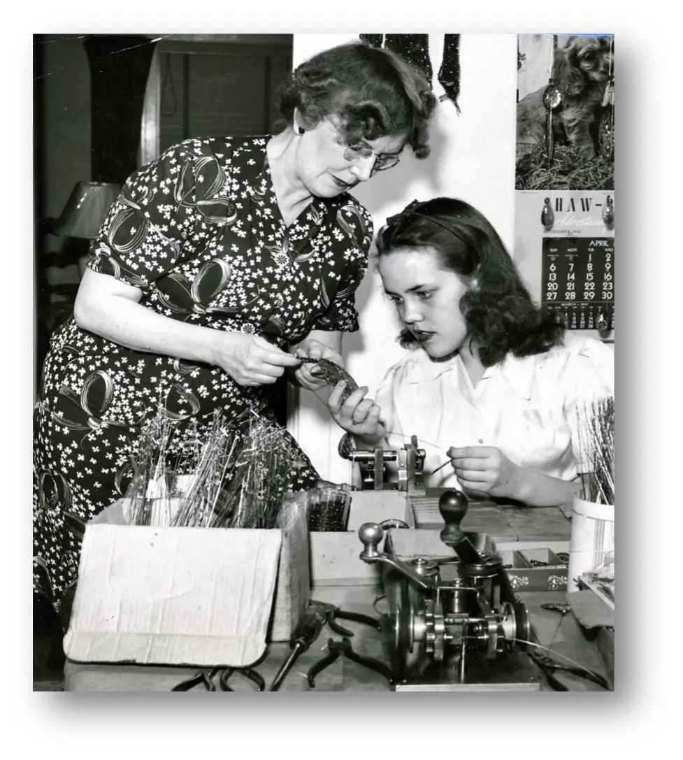Mrs. Alice Lloyd and her daughter Patricia hard at her work assembling Jack Lloyd trolling lures, 1947. Photograph courtesy Kirkland Historical Society.