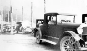 Automobiles lined up on the Kuskanook wharf awaiting the arrival of the Nasookin