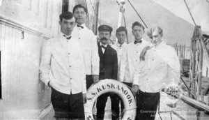Dining room stewards aboard the Kuskanook. Some of these men later served aboard the Nasookin attending to motorists in the dining saloon and helping with their luggage