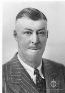 Public Works minister Rolf W. Bruhn. He was instrumental in establishing the ferry service between Fraser’s Landing (Balfour) and Gray Creek in 1930